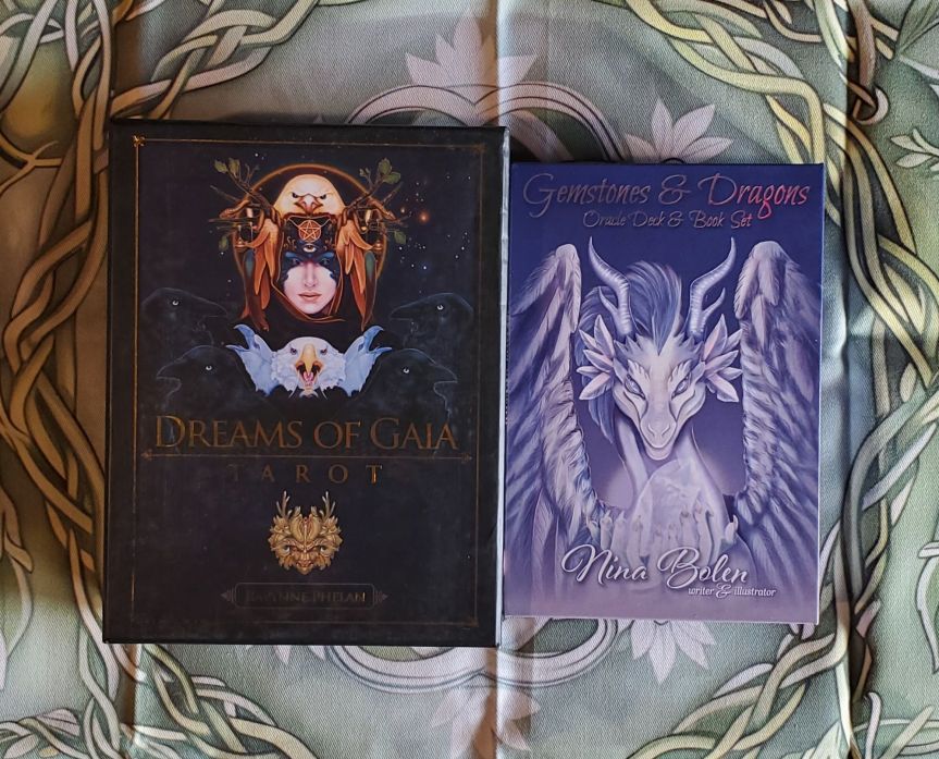 Dreams of Gaia Tarot by Ravynne Phelan and Gemstones & Dragons Oracle by Nina Bolen